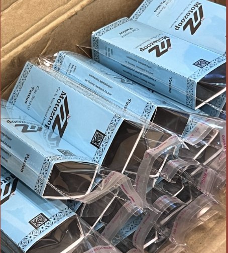 Finished Motozoop perfume boxes, packed and ready to ship
