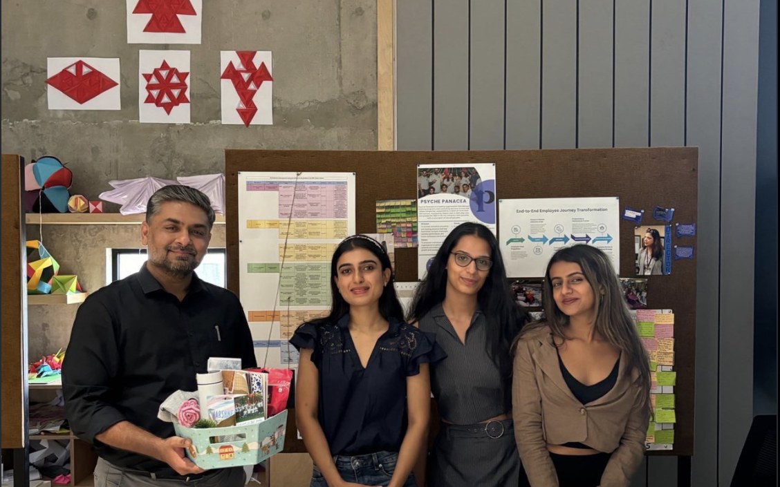 The Psyche Panacea team presenting the onboarding hamper to the client